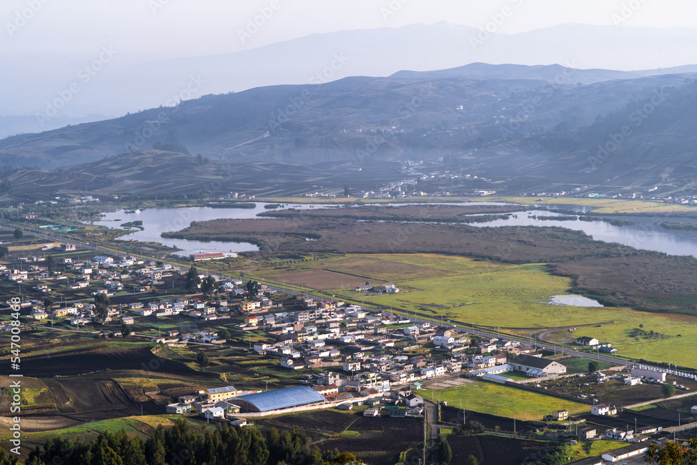 Beautiful lagoon near mountains and a city, Colta Lake