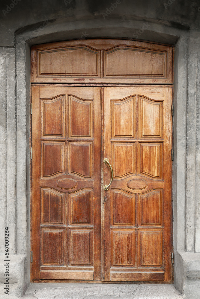 Wooden vintage doors of old building