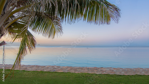 The Royal Commission  Yanbu   Medina  Saudi Arabia. February 2nd  2022. The beach and adjacent parks at night  dawn and dusk times. Trees especially palm are shown. Black and colorful skies. Pathways.