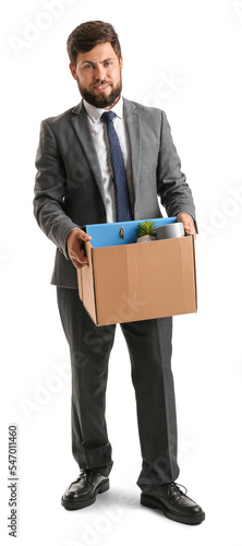 Fired young man holding box...