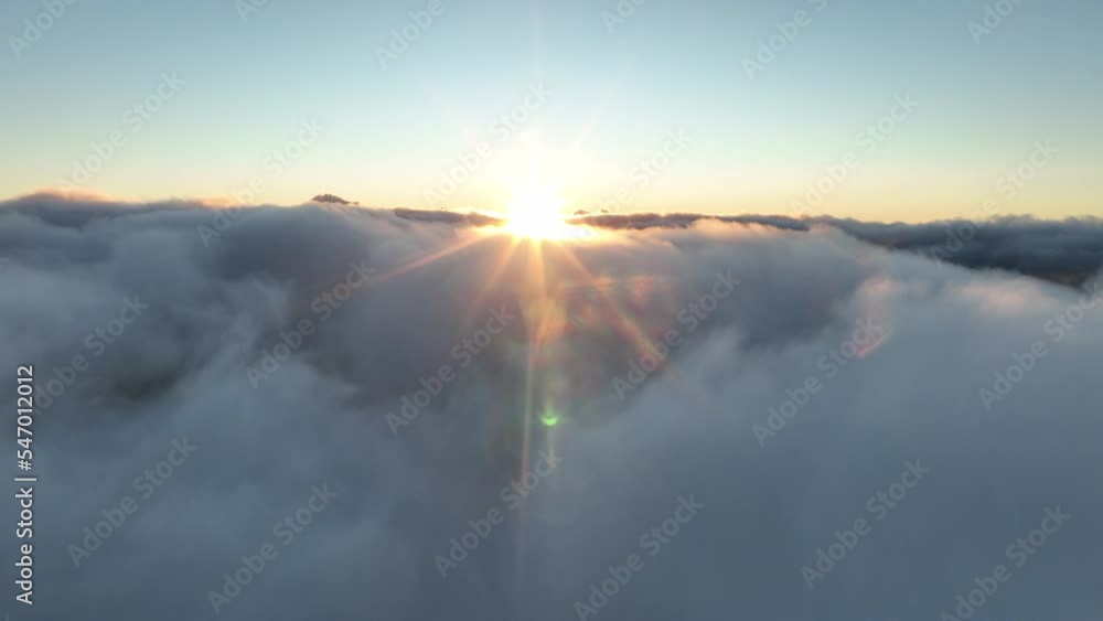 Drone going through clouds during sunset in Madeira, Portugal Drone going through clouds during sunset in Madeira, Portugal
