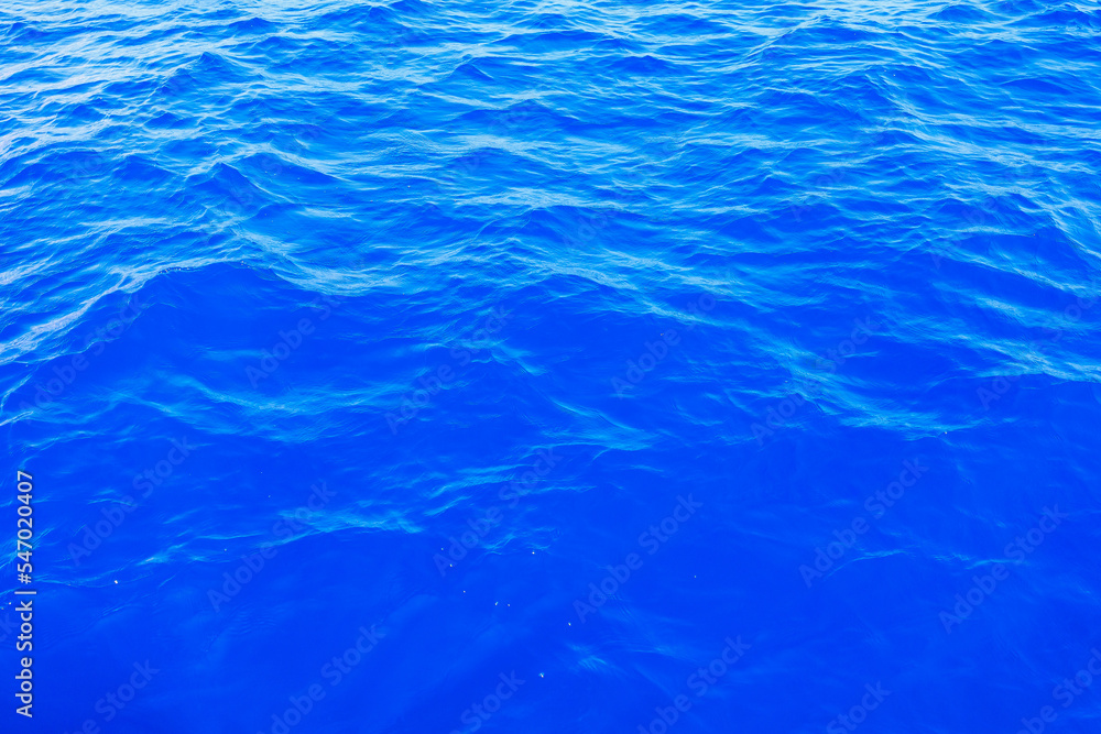 Very nice sea water background or backdrop with selective focus. Small waves of natural water surface texture. Very nice sea water background or backdrop with selective focus. Small waves of natural water surface texture.