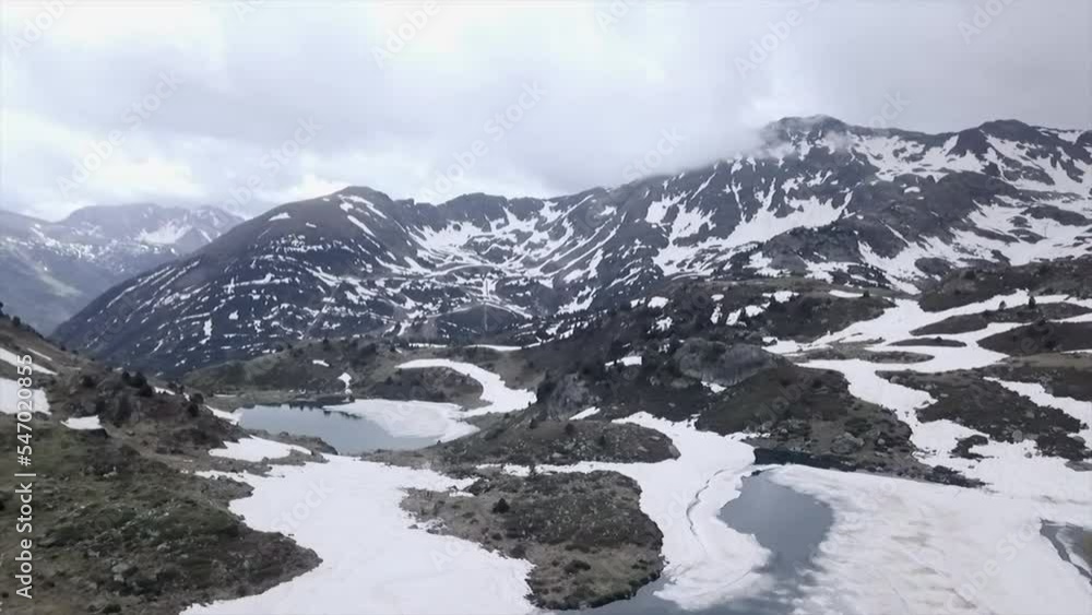 Snow covered valley with lakes in the lower part as seen from the air Snow covered valley with lakes in the lower part as seen from the air