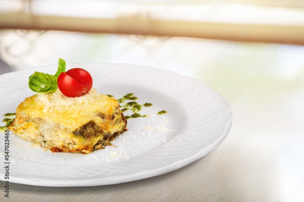 Traditional tasty fresh lasagna dish with sauce
