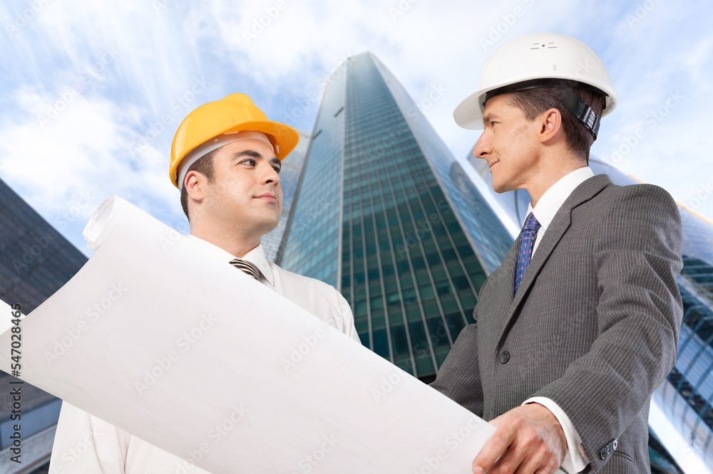 Young engineer worker on construction building site. Young engineer worker on construction building site.