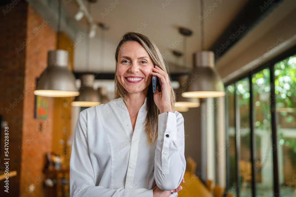 one woman mature adult middle aged caucasian female make a phone call