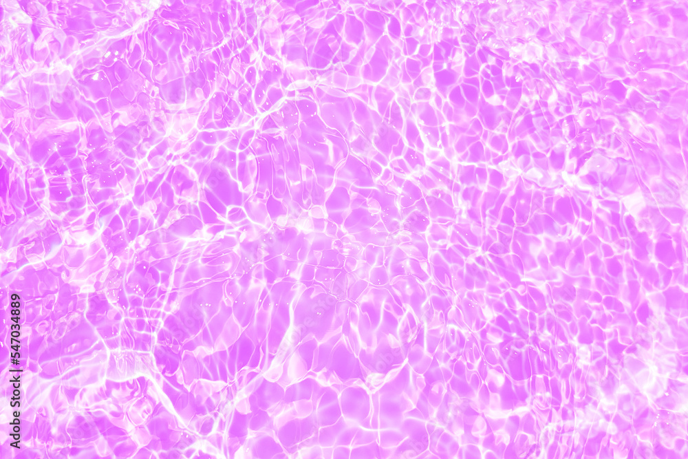 Defocus blurred transparent purple colored clear calm water surface texture with splashes and bubbles. Trendy abstract nature background. Water waves in sunlight with copy space. Pink watercolor shine