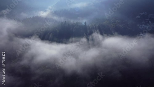 Areal drone footage from Karpenisi area, into the mountains and lake.