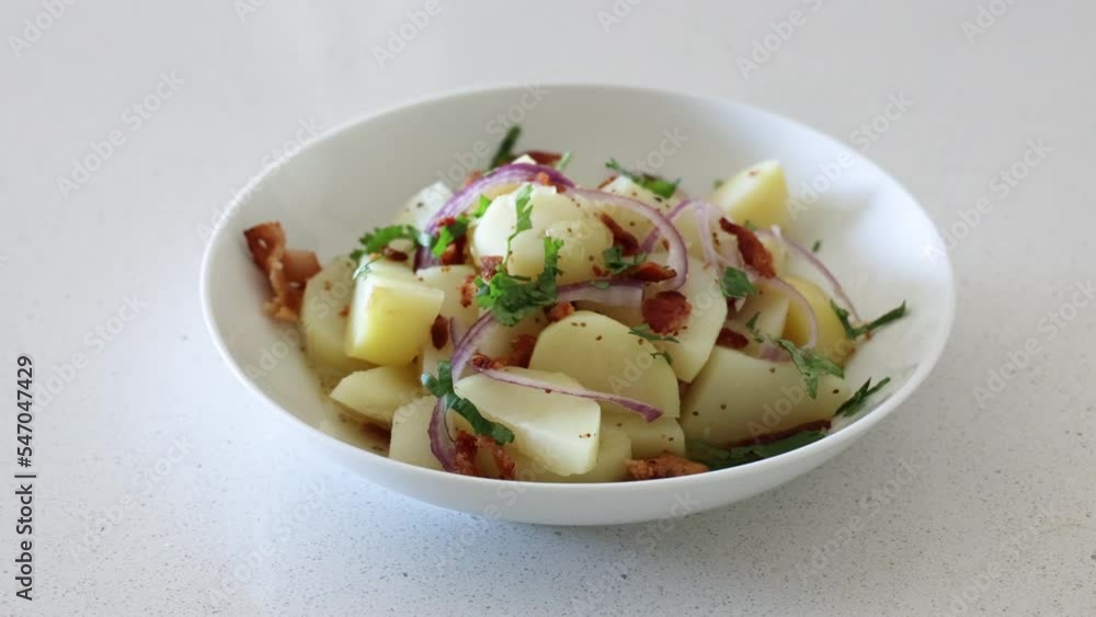 Serving a Bowl of German Potato Salad Serving a Bowl of German Potato Salad