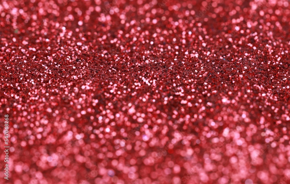 Beautiful shiny red glitter bokeh lights abstract background. Christmas holiday background. Copy space. 