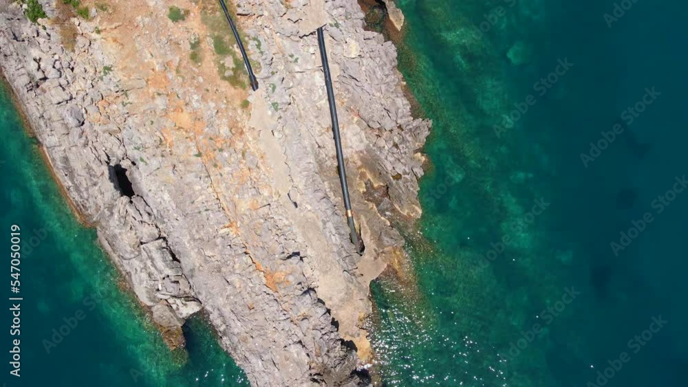 Aerial video. Canalization pipes go to the sea. Sea pollution concept Aerial video. Canalization pipes go to the sea. Sea pollution concept