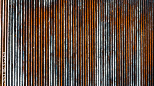 Fotografija Artistic of old and rusty zinc sheet wall
