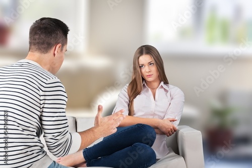 Divorce concept. Sad couple on the sofa
