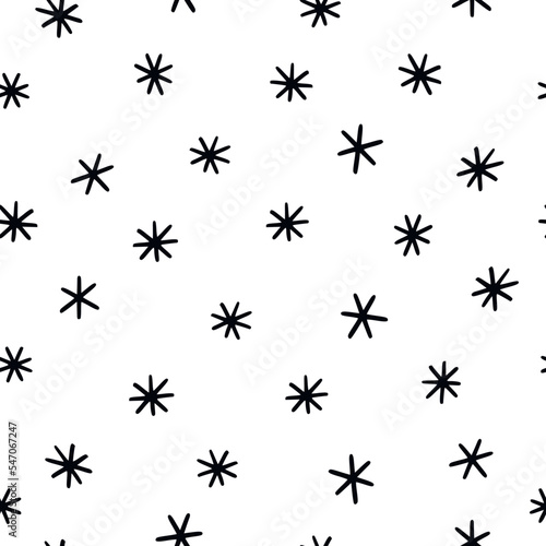 Seamless pattern with simple doodle snowflakes. Black and white vector picture.