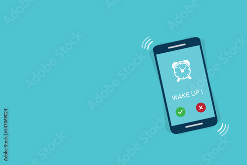 Alarm. Phone with app alarm clock on the screen.