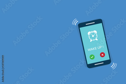 Alarm. Phone with app alarm clock on the screen.