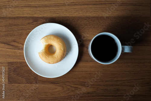 breakfast with donut homemade and coffee cup