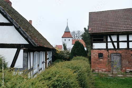 Half-timbered buildings in Swolowo on Polish central Pomerania, near Slupsk, Poland. Swolowo is a village known for its half-timbered buildings (Prussian wall) photo