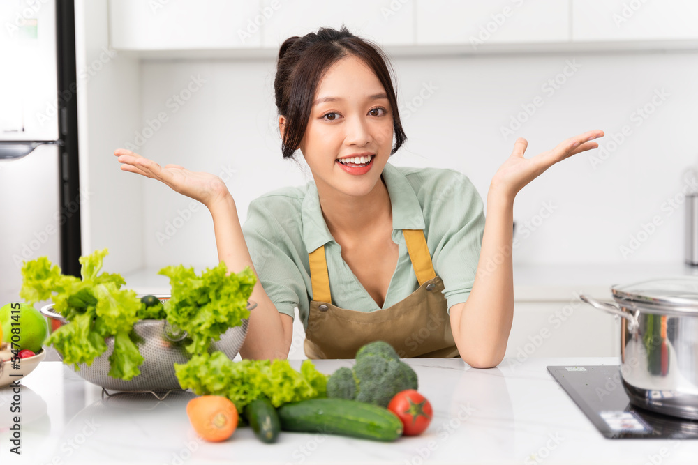 Portrait of a housewife in the kitchen at home Portrait of a housewife in the kitchen at home
