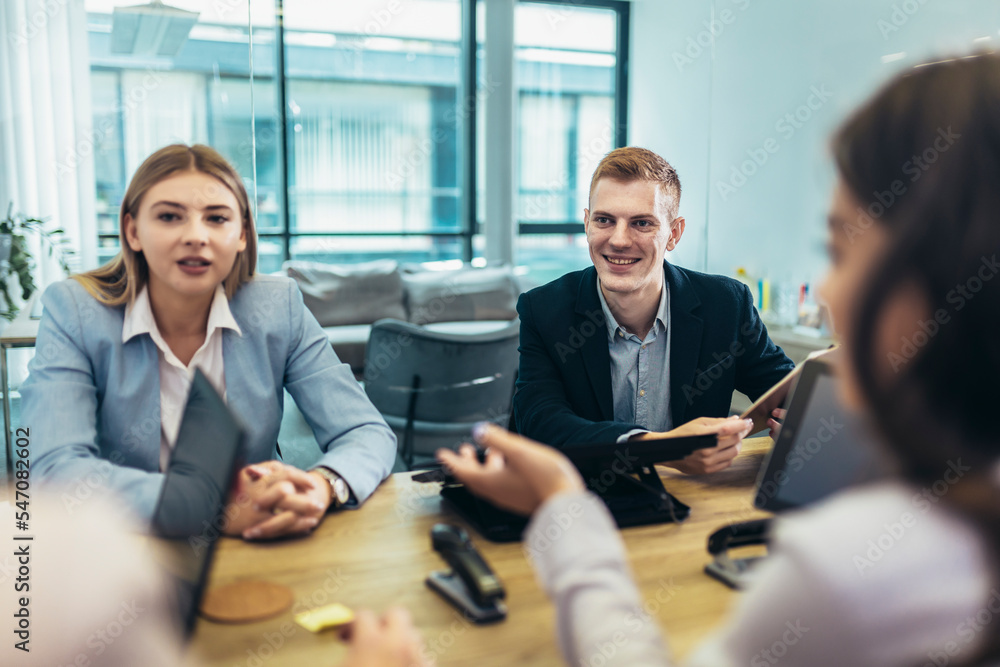 Business people having discussion during meeting Business people having discussion during meeting