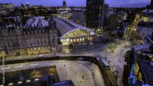 Night drone hyperlapse of entrance to Lime Street railway station, Liverpool photo