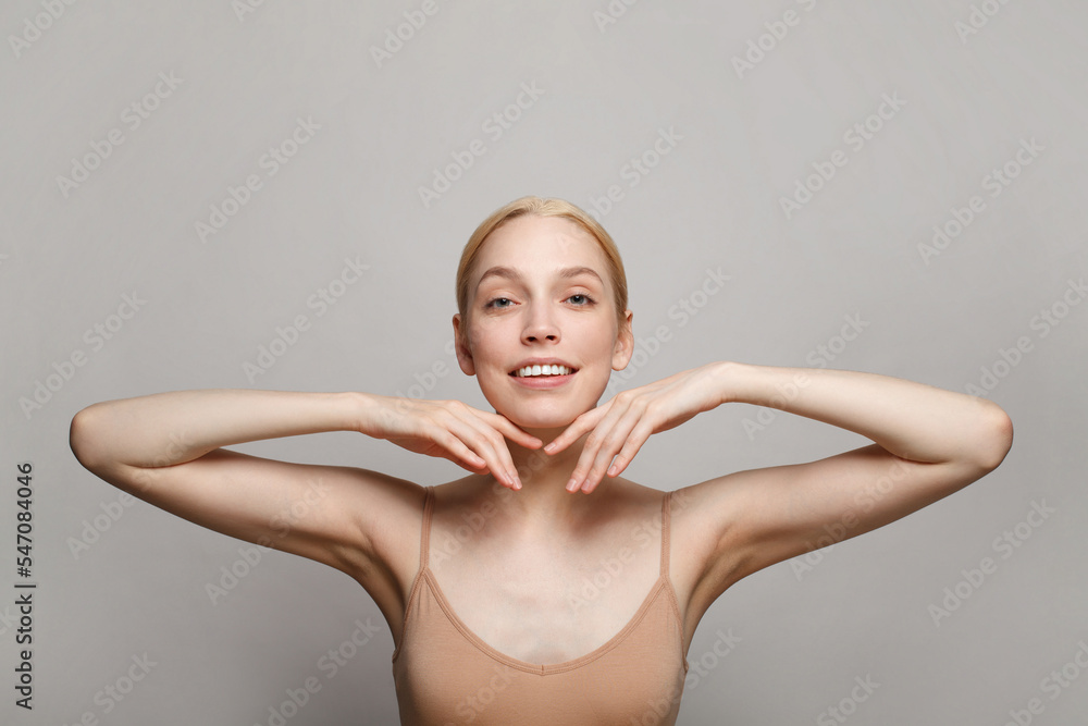 Natural beauty portrait of female face and body with perfect fresh skin on white background Natural beauty portrait of female face and body with perfect fresh skin on white background