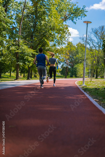 Two adults running