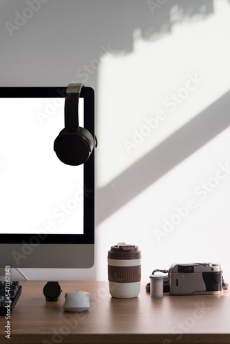 Computer equipment and digital products are on the desk in the study