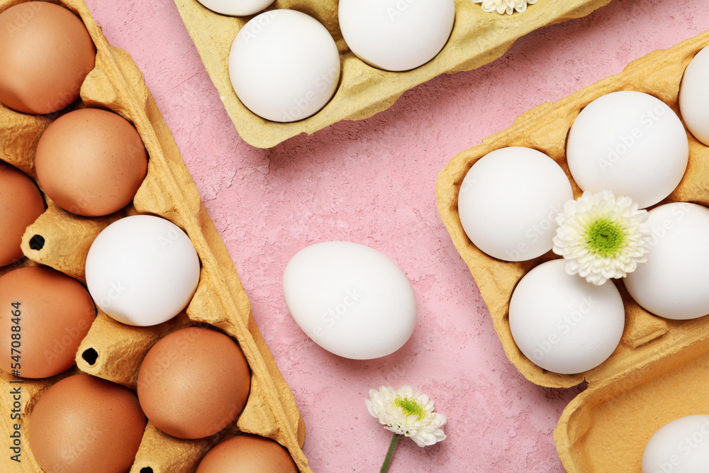 Concept of spring, eggs with flowers, top view Concept of spring, eggs with flowers, top view