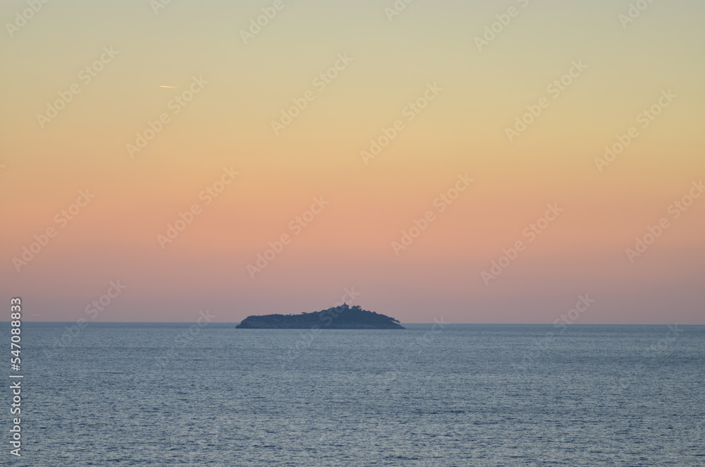 Sun is gone Dawn at Sea mountain silhouette colorfull Ocean Horizon