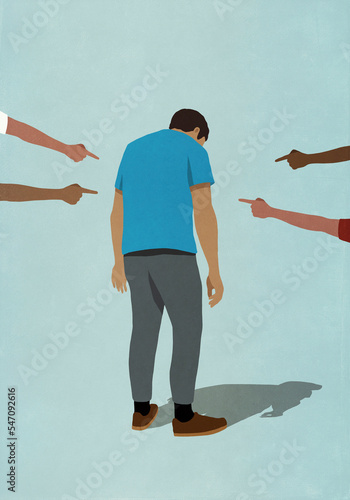 Fingers pointing at dejected man
 photo