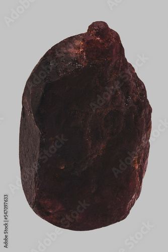 Close up still life dark red Thai sapphire on gray background
 photo