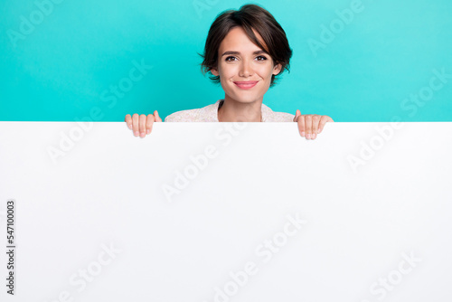 Print op canvas Photo of sweet bob hairdo lady hide under banner isolated on teal color backgrou