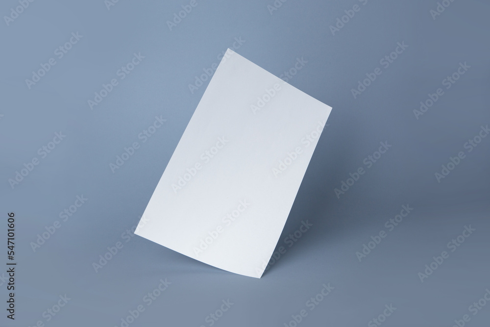 White blank paper page with shadow isolated on grey color background White blank paper page with shadow isolated on grey color background