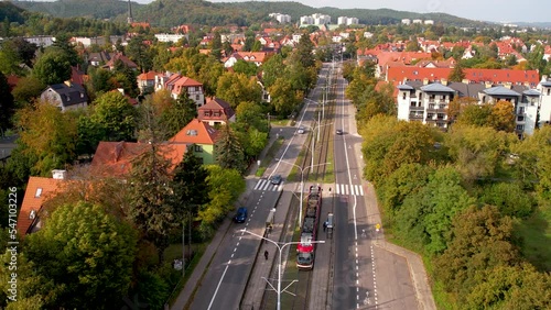Suburban Avenue Street and Tram Transportation in Oliwa Suburb District of Gdansk City Poland, Residential Neighborhood Homes Hills and Forest Surroundings photo