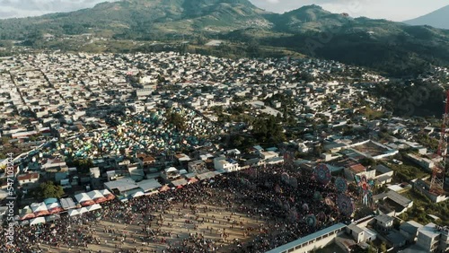 Sumpango Town Revealed Crowded People During The Kite Festival Held On All Saint's Day In Guatemala. Aerial Tilt-Down photo