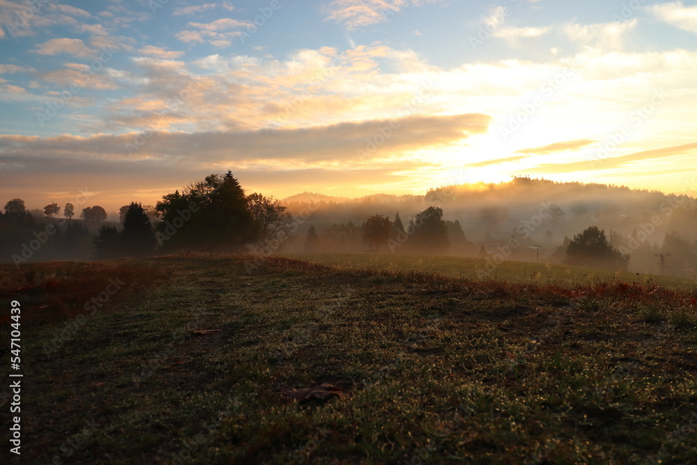 panorama of mountain landscape with morning fog and sunrise panorama of mountain landscape with morning fog and sunrise