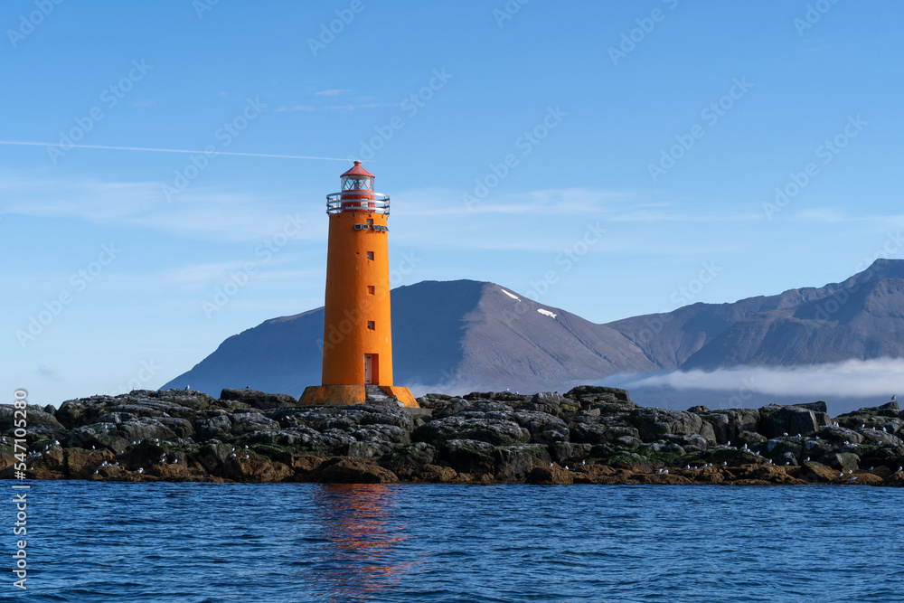Beautiful Lighthouse in the Middle of  a Fjord