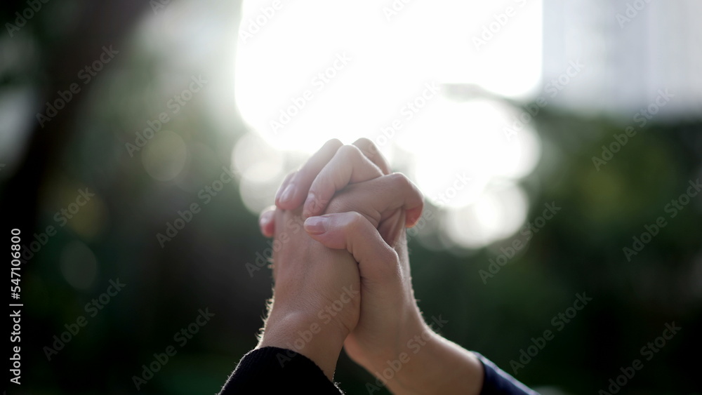 Two people holding hands together in union. Women physical connection in SUPPORT2
