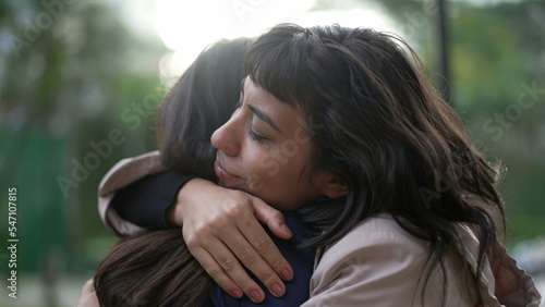 Slika na platnu Sympathetic woman hugging friend with EMPATHY and SUPPORT