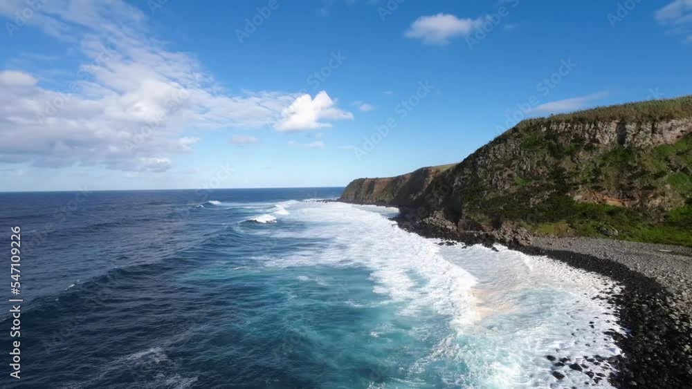 aerial view Flight Over Rocky Coastline. Ocean Shore, Waves Crashing Cliffs, Azores aerial view Flight Over Rocky Coastline. Ocean Shore, Waves Crashing Cliffs, Azores