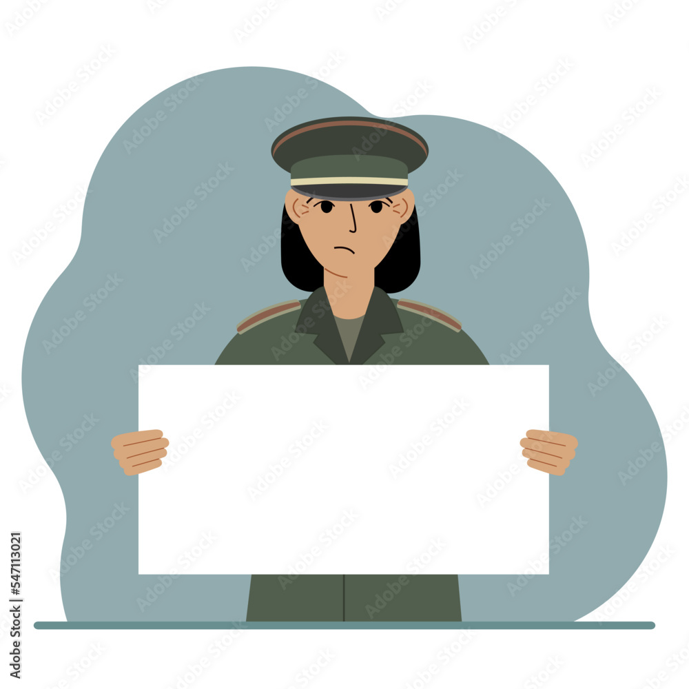 A military man in uniform holds a white sheet of paper in his hands. Concept for advertising, poster, banner. A military man in uniform holds a white sheet of paper in his hands. Concept for advertising, poster, banner.