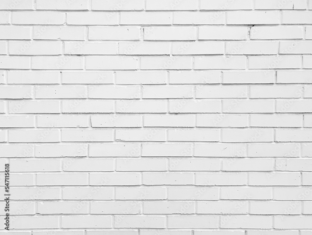 Old bright white brick tiles wall textured background. Kitchen