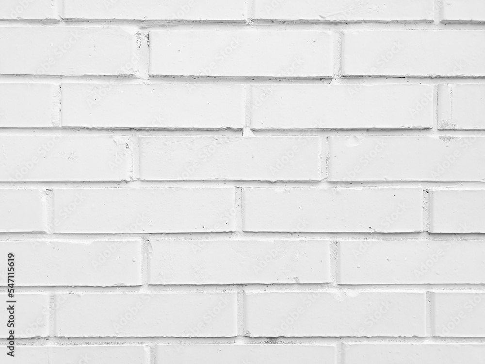 Fototapeta premium White brick wall closeup textured background