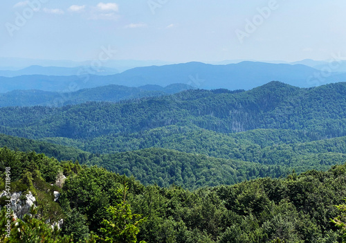 View of distant hills and mountain forests of Gorski Kotar from Risnjak National Park, Croatia (Pogled na udaljene brijegove i planinske šume Gorskog kotara iz nacionalnog parka Risnjak - Gorski kotar