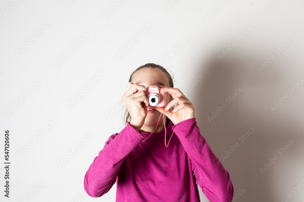 Little Girl Taking Picture Using Toy Photo Camera Little Girl Taking Picture Using Toy Photo Camera