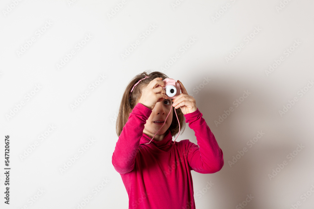 Little Girl Taking Picture Using Toy Photo Camera Little Girl Taking Picture Using Toy Photo Camera