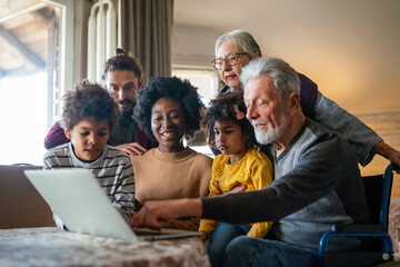 Portrait of a happy multigenerational multiethnic family at home.