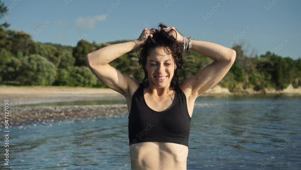 Portrait of screaming and smiling caucasian woman, beach in background, real unaffected emotions Portrait of screaming and smiling caucasian woman, beach in background, real unaffected emotions