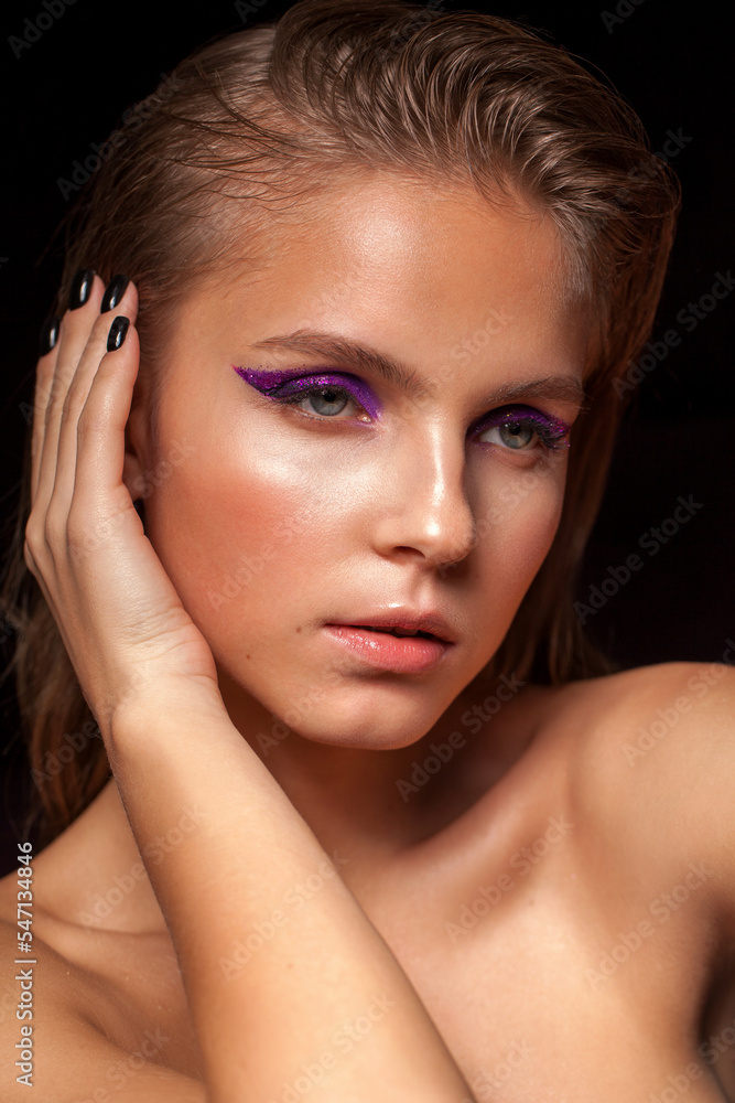 Naklejka premium young blond fashion model with bright make up